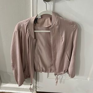 Pink bomber jacket with zipper close